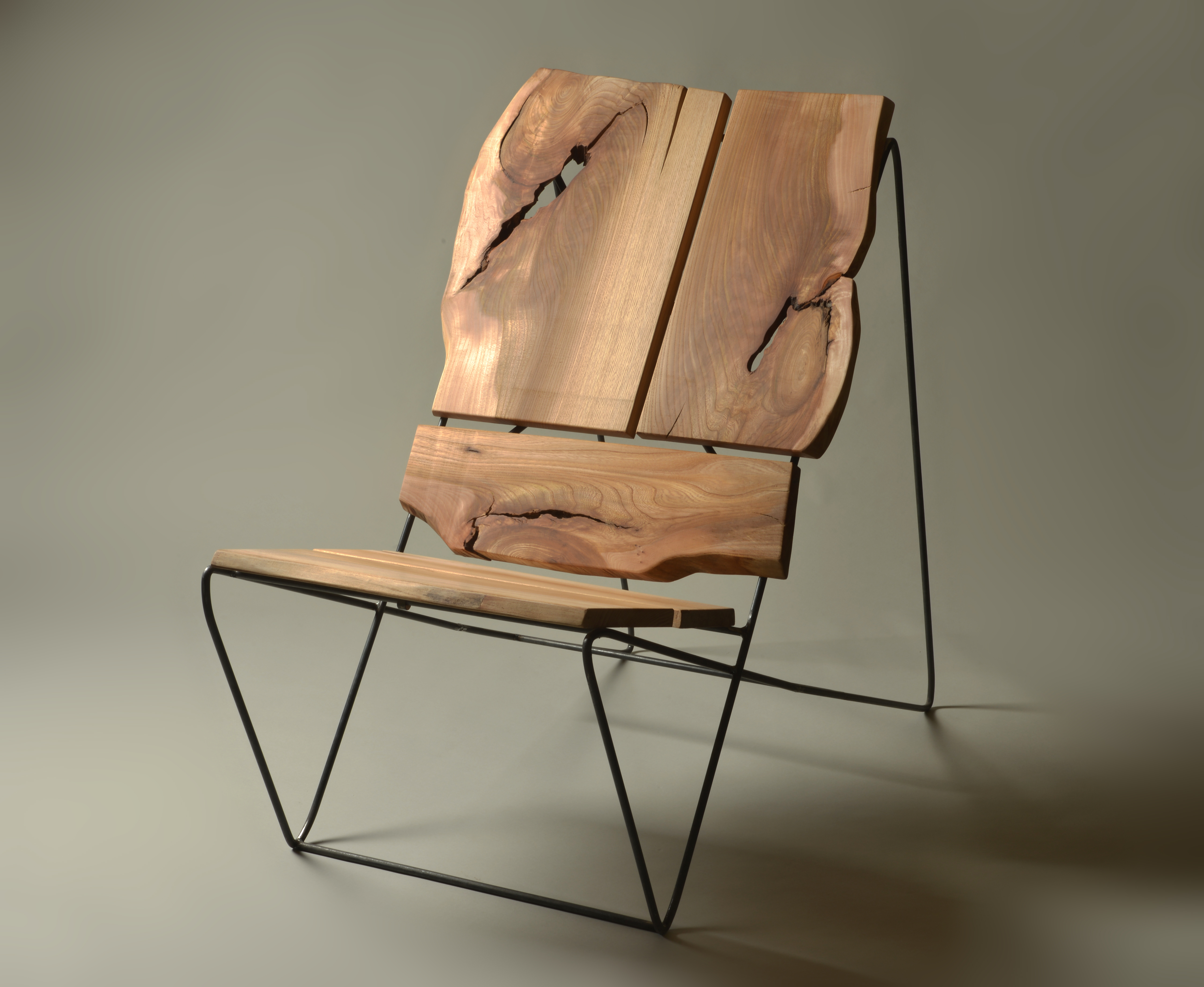 Designer armchair made of natural wood