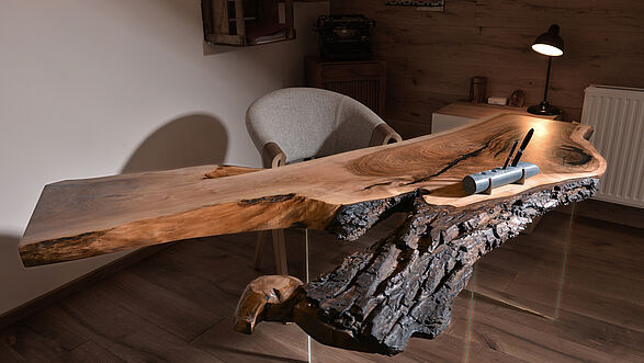 Natural wood desk from a tree trunk